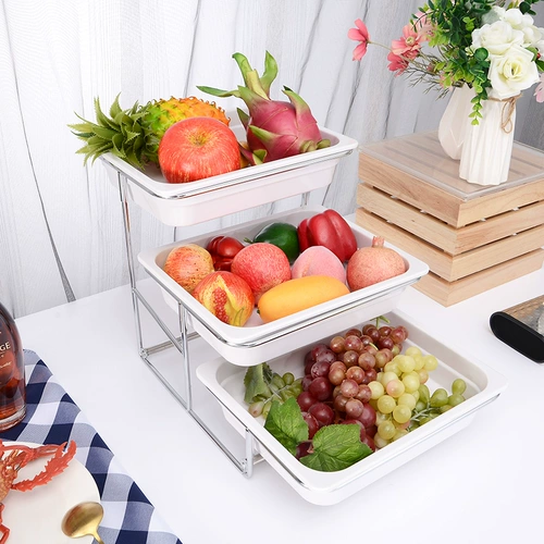 Много -слоистые фрукты поддоны торт с закусками отель отель 