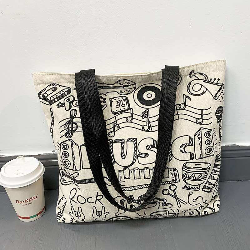 小众设计今年流行帆布包女夏新款2025年大容量单肩上课通勤手提袋