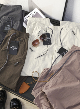 华子家 男女同款户外防泼水多口袋工装裤抽绳弯刀休闲裤长裤44558