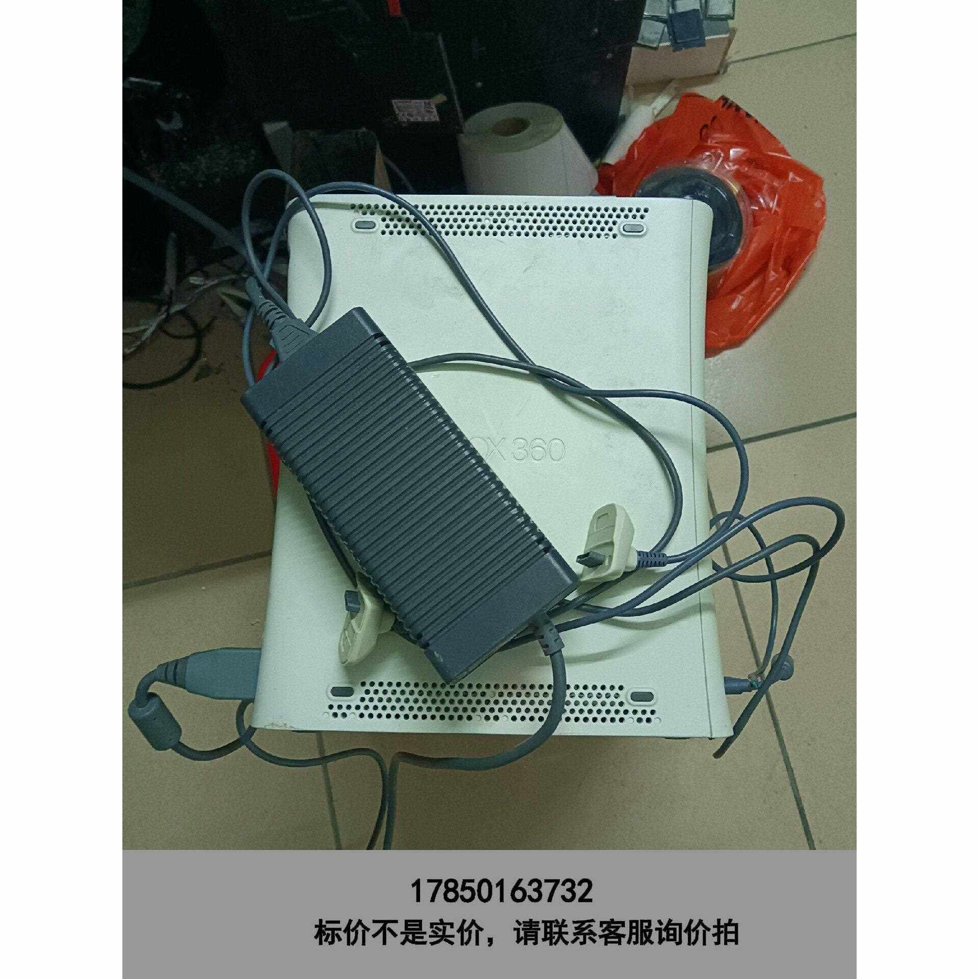 标价是空箱-Xbox360，无配件，不通电问题机器来的，标签位置已砸