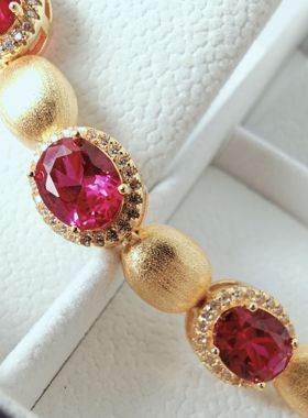 Ruby bracelet with Italian woven gold carving technique