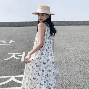 露肩休闲印花挂脖连衣裙女2025夏季新款时尚宽松温柔风沙滩吊带裙图片
