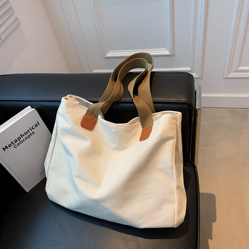 2025夏季新款日系通勤帆布包单肩包大容量百搭布袋托特包女夏季白