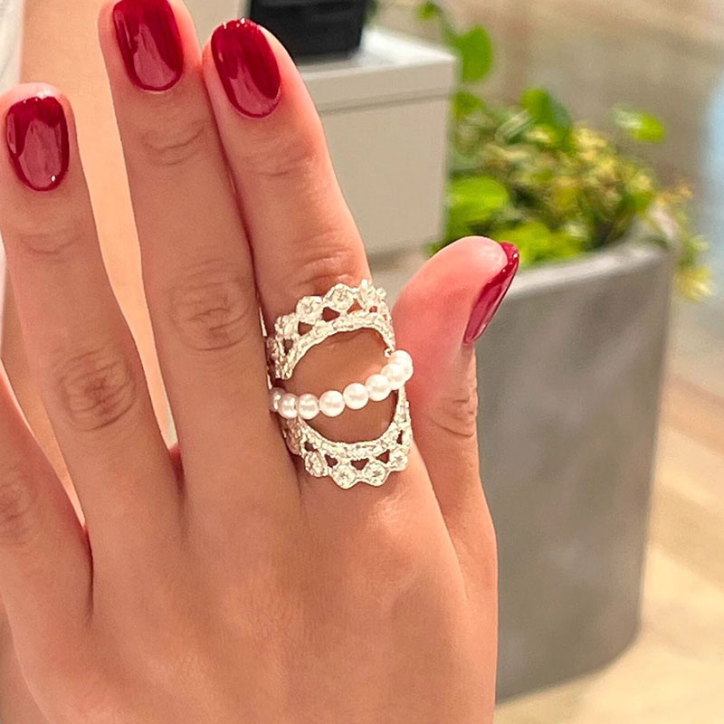 今饰有约银色镂空椭圆珍珠戒指