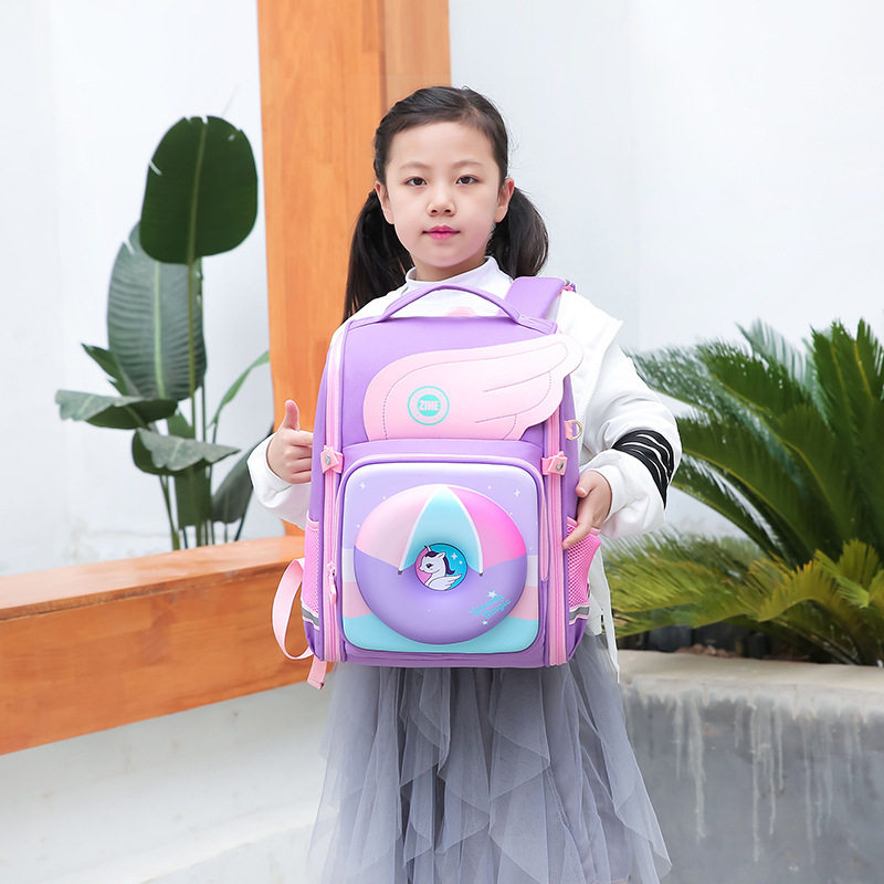 儿童卡通双肩背包太空小学书包女童高档减负护脊甜甜圈小学生书包