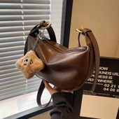 今年流行包包女2026新款 高级感百搭单肩包美拉德风复古斜挎饺子包