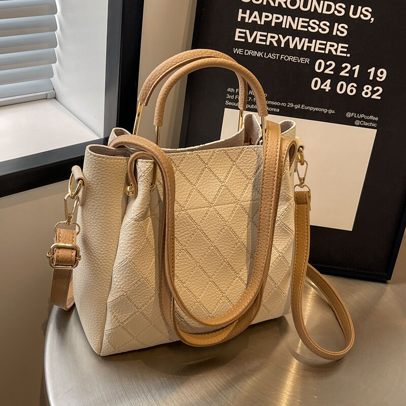 大容量包包女士2026新款上班通勤单肩包秋冬百搭斜挎包手提水桶包