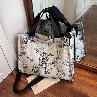 新中式国风帆布包女2025新款休闲通勤斜挎包轻便大容量手提托特包