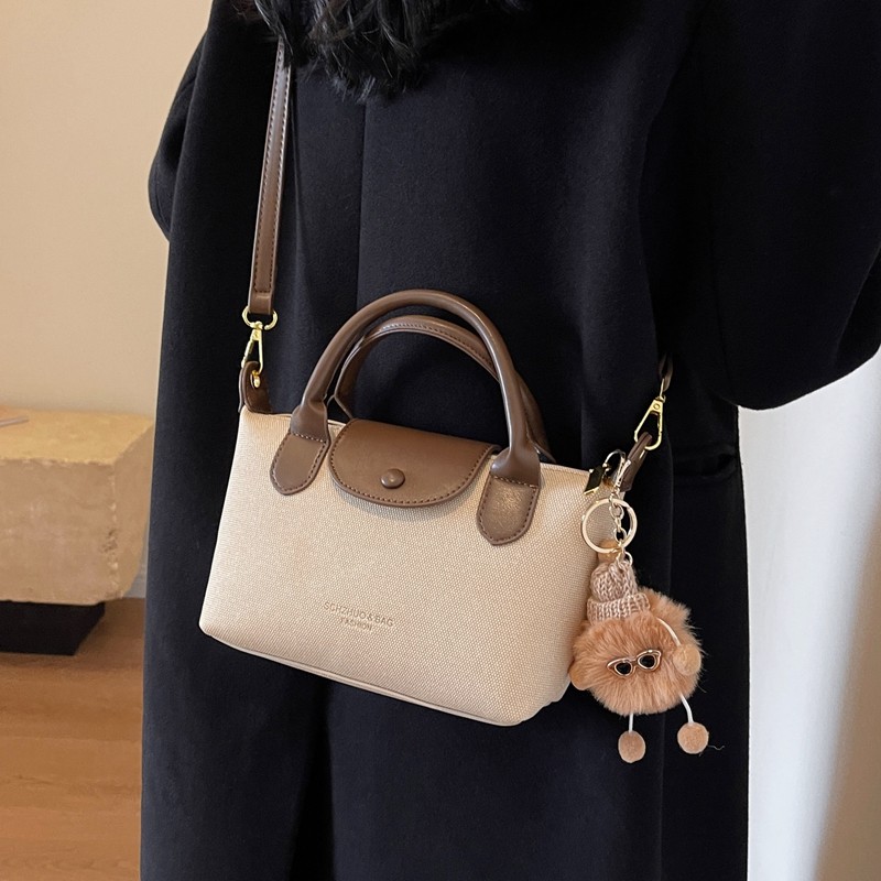 小包包女2026新款小众迷你手提饺子包时尚百搭帆布单肩斜挎手机包