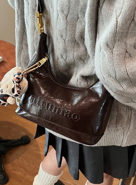 高级感小众包包女式2025新款超火单肩斜挎包美拉德复古手提饺子包