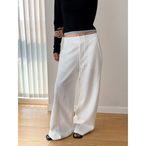 AMBOSC韩国立体剪裁拼接弯刀裤