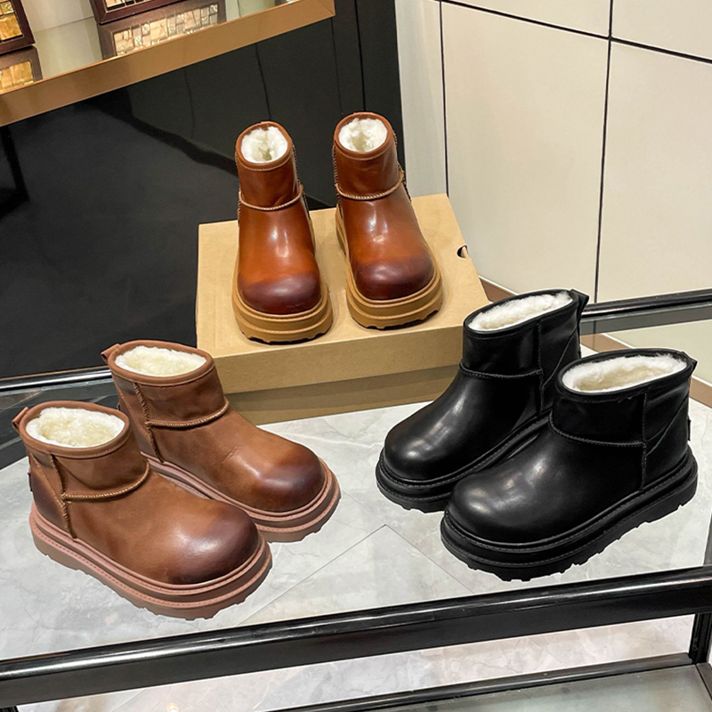 雪地靴女皮毛一体2025新款冬洋气保暖短靴防水厚底真皮面包大棉鞋