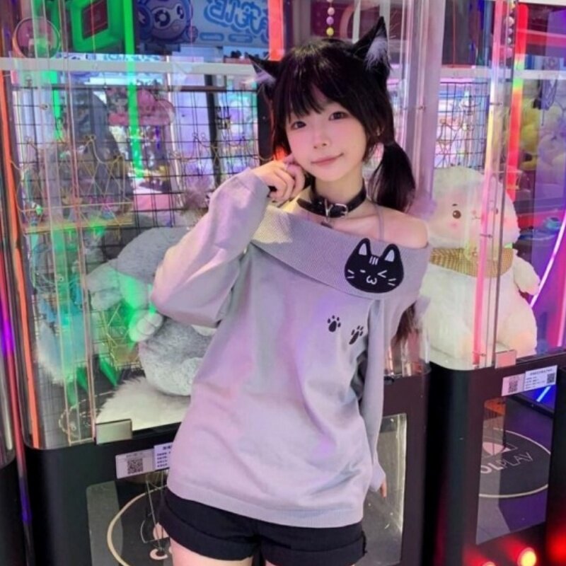 韩版hiphop可爱猫咪一字领女春秋甜辣设计感德绒长袖纯欲修身上衣