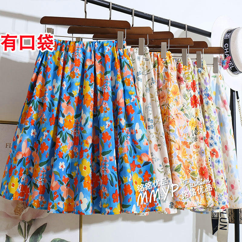 流行多巴胺蓝色油画风碎花短裙半身裙女夏季2026新款橘色印花裙子