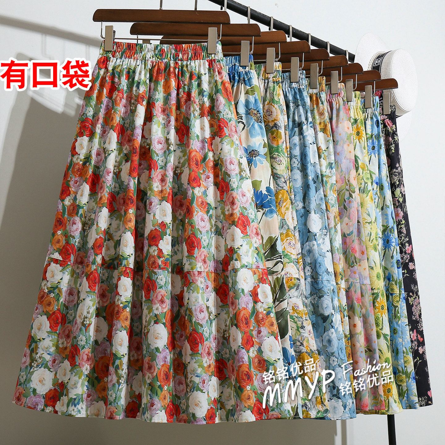 高级红色油画风碎花半身裙女2026夏季新款印花a字伞裙花裙子长裙