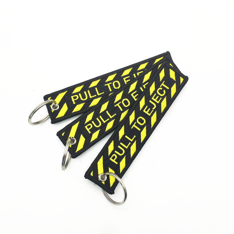 定制绣花锁匙扣卡通文字pull to eject 时尚流行摩托车刺绣钥匙扣