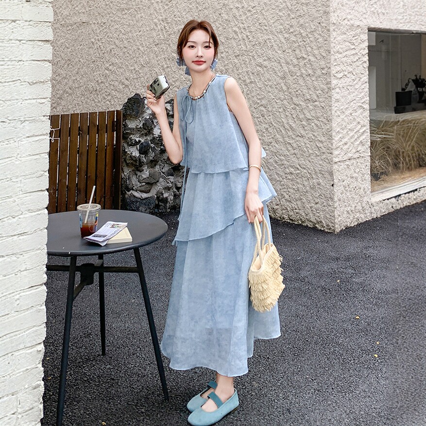 法式温柔漂亮绝美无袖背心连衣裙女夏度假不规则荷叶边遮肉蛋糕裙