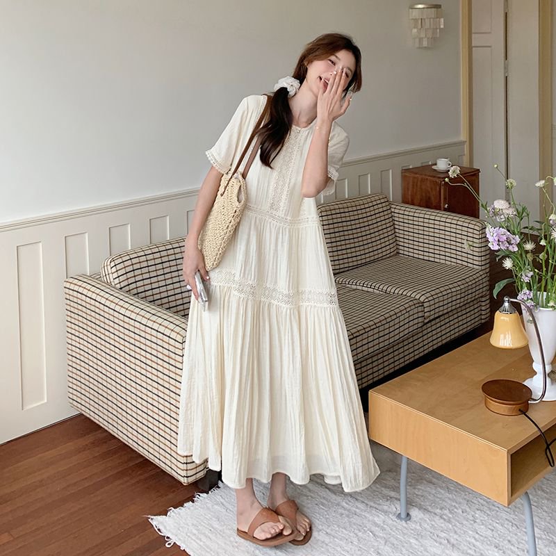 温柔风法式蕾丝拼接连衣裙女夏季新款减龄气质海边度假宽松长裙子