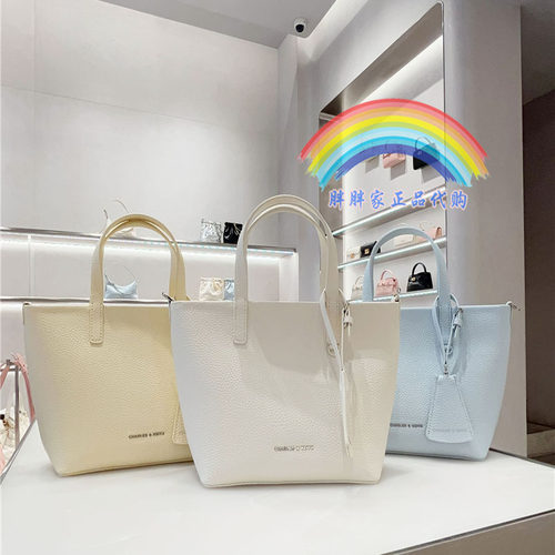 小CK荔枝纹拉链手提斜挎