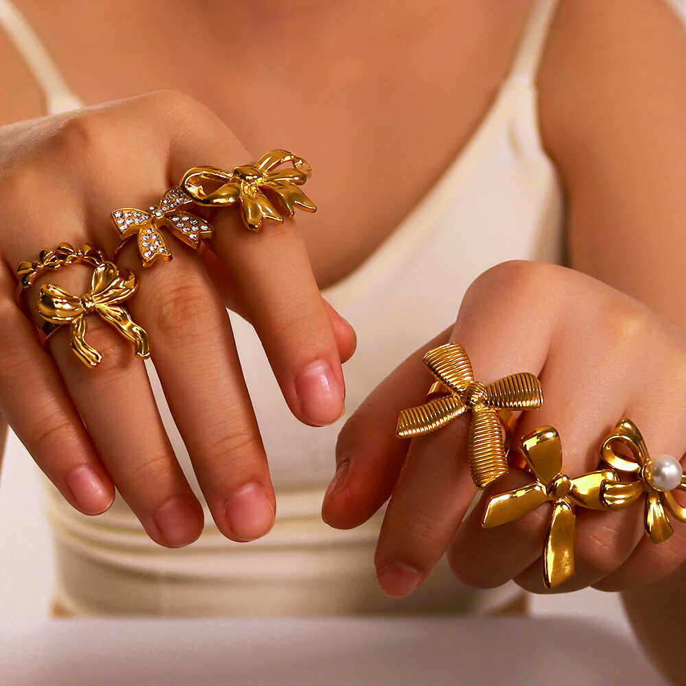 欧美不锈钢镀18k金蝴蝶结开口戒指女ins风戒指光面镶钻镶珍珠