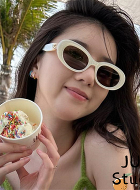 高级感珍珠白墨镜椭圆形2023