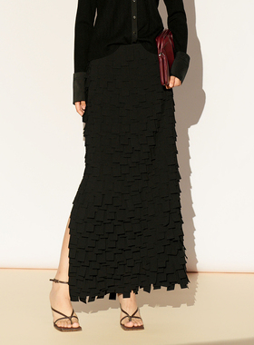 XG/雪歌26年春季新款轻熟流苏半身长裙女设计感半裙XL103019A190