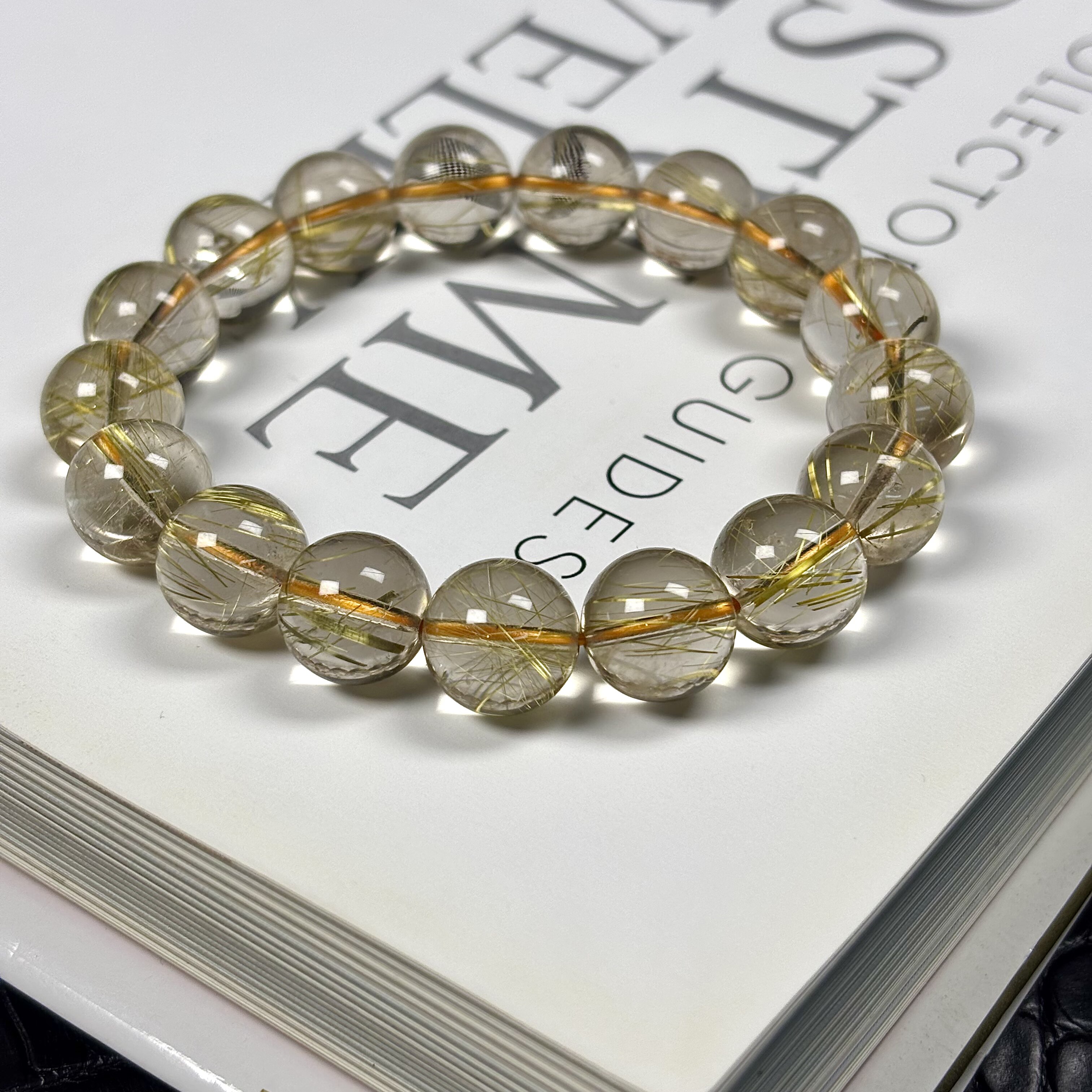 晶体干净水头足 巴西透体板钛晶单圈手串