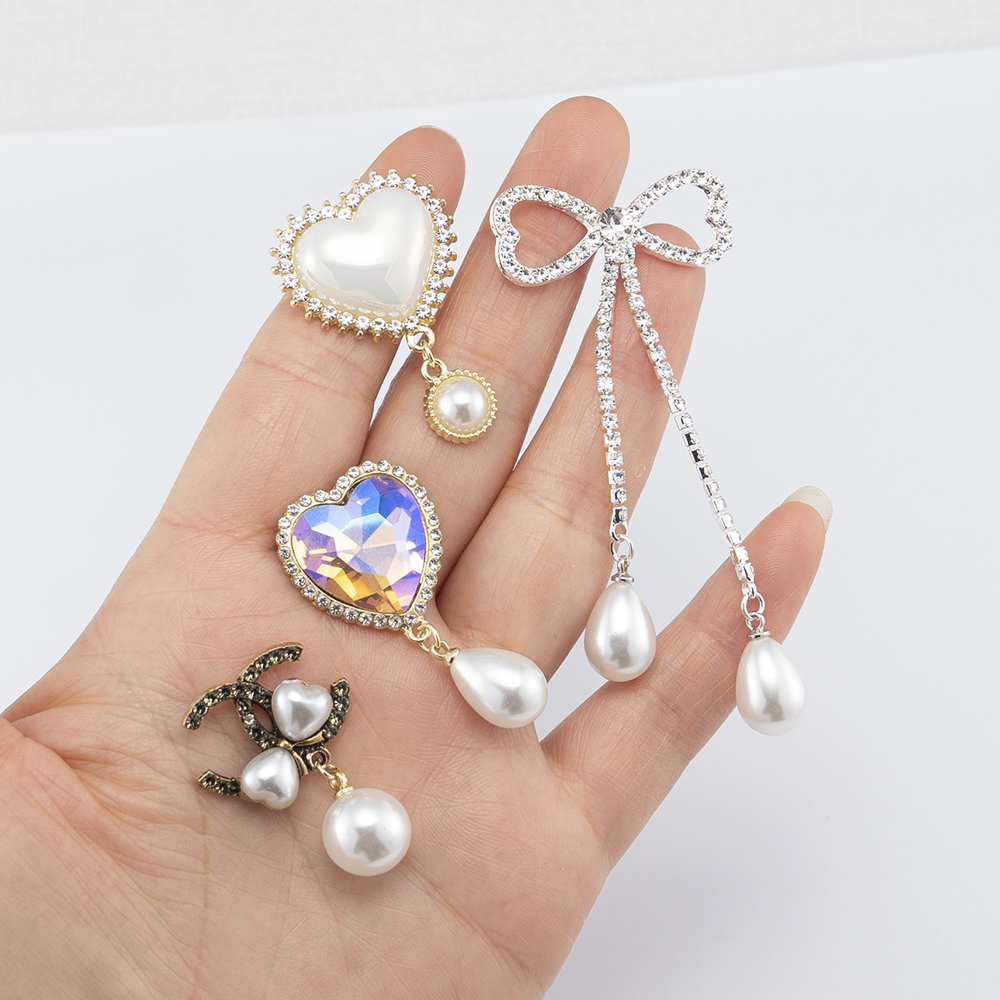 合金仿贝珍珠蝴蝶结钻盘吊坠