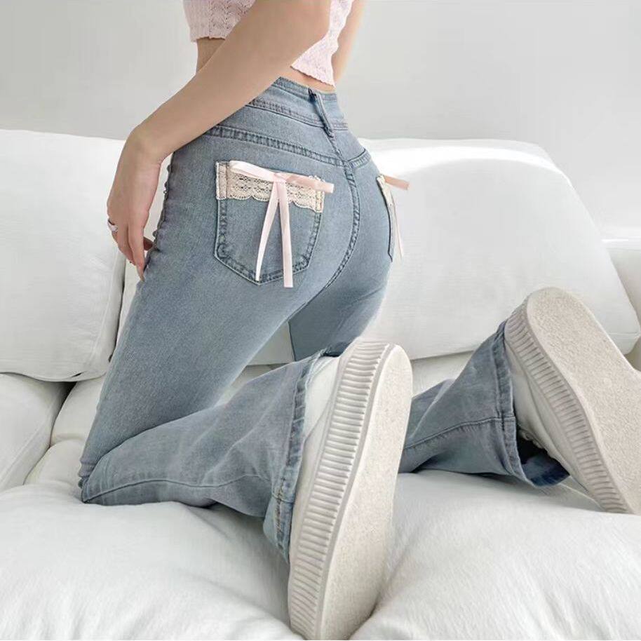 美式口袋蝴蝶结微喇牛仔裤女2026夏季掐腰丰胯翘臀显瘦拖地马蹄裤