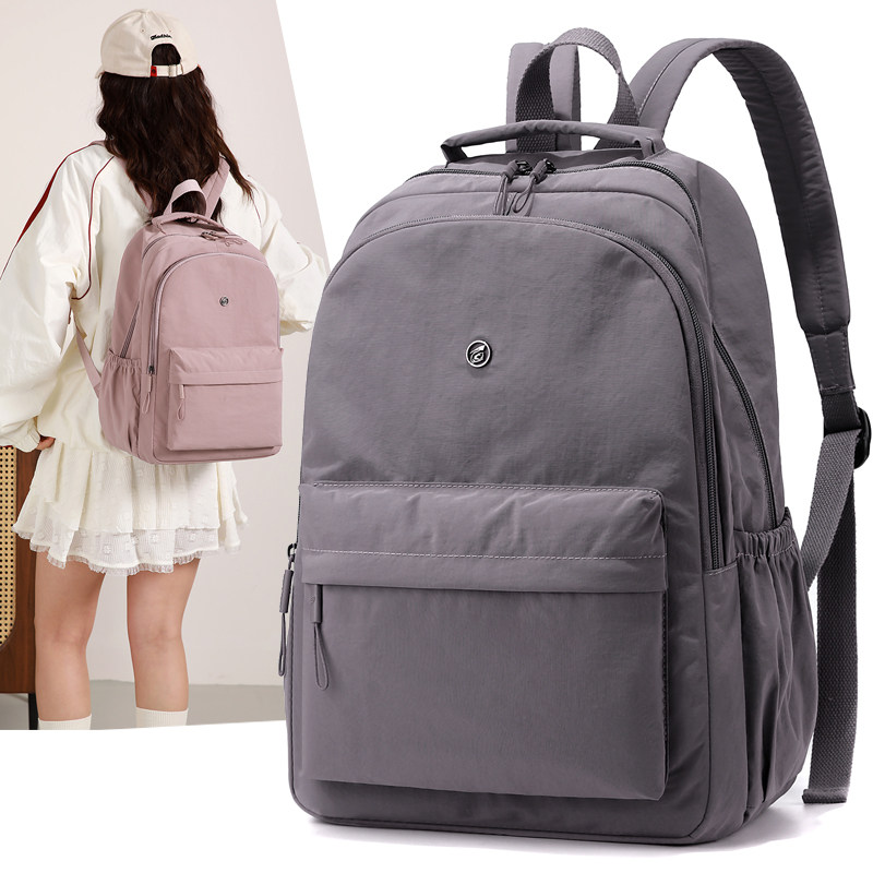 牛津布双肩包女2026新款轻便旅游减压背负书包旅行女士通勤背包