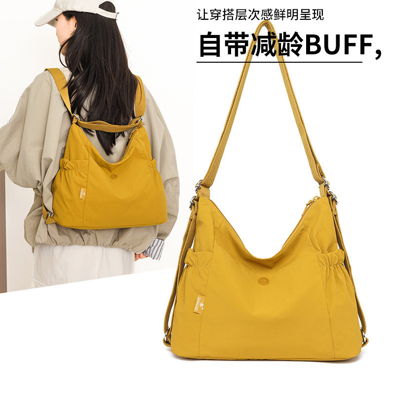 大容量单肩包女两用双肩包女外出通勤书包旅行轻便背包多层斜挎包