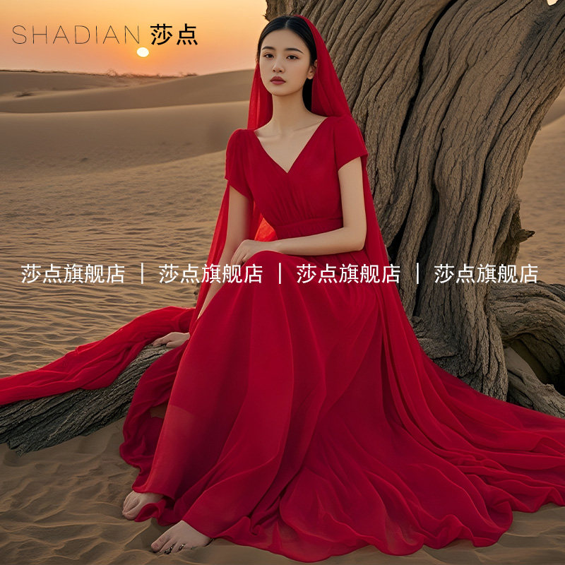 红色V领薄纱连衣裙雪纺裙子女夏2026新款度假风沙漠长裙高级感