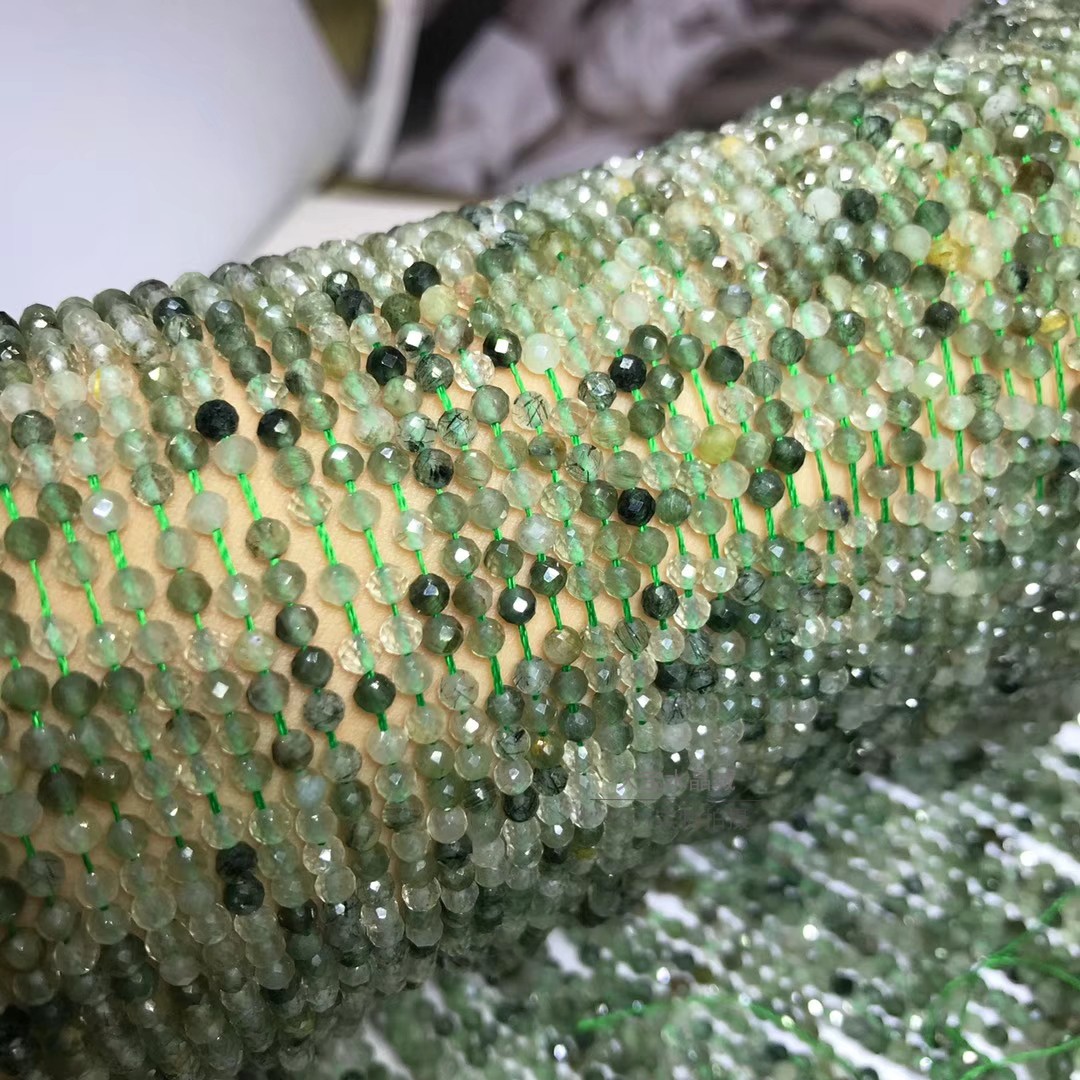 天然绿发晶刻面半成品散珠图片