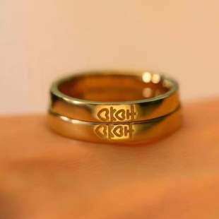 仿真结婚对戒新款求婚一对情侣款双喜字戒指仿黄金色婚礼道具气质