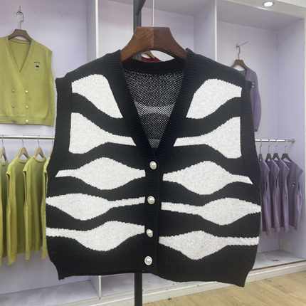 647-709 秋冬新款V领针织马甲女外穿无袖毛衣开衫背心斑马纹坎肩