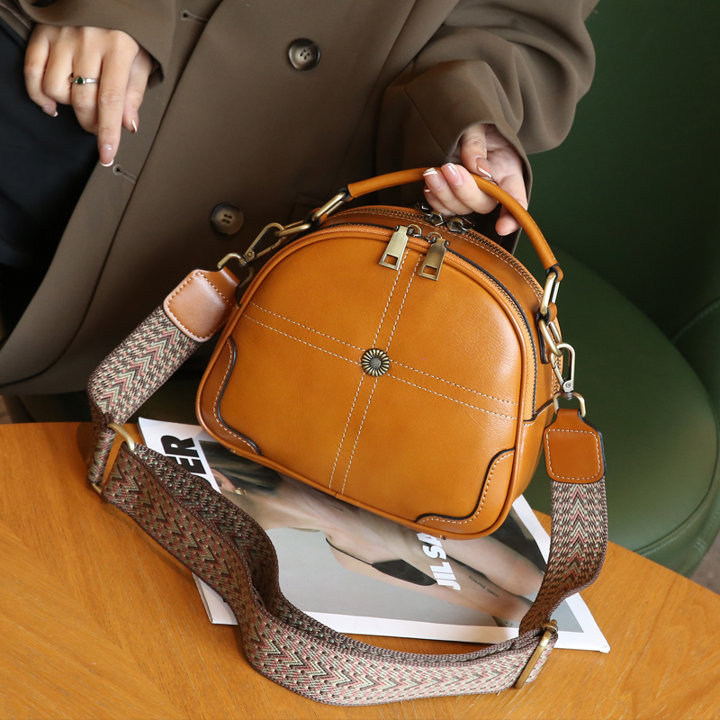 纯牛皮斜挎手提小圆包女时尚2025新款真皮双拉链大容量单肩苹果包