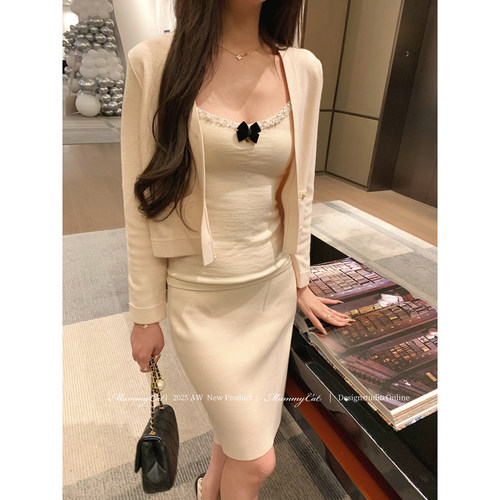 精致通勤纽扣针织开衫半裙套装