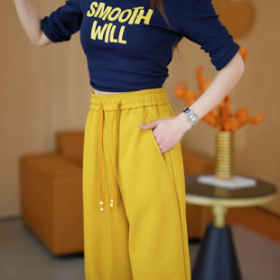 亮闪闪黄色高腰弯刀裤女2026春季新款宽松休闲裤百搭运动直筒卫裤