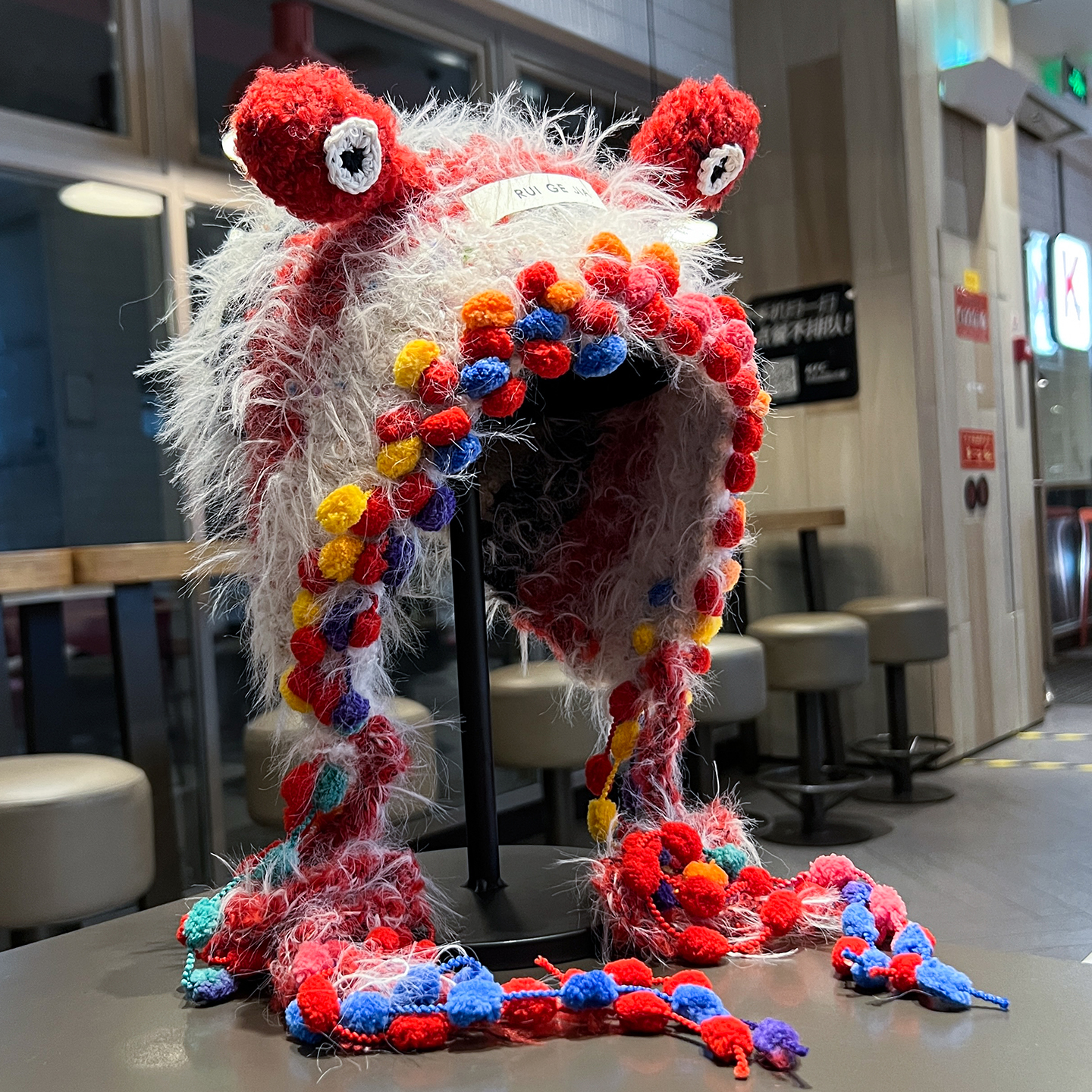 可爱蜗牛混彩流苏毛绒帽子女秋冬季加厚加绒护耳帽手工针织包头帽