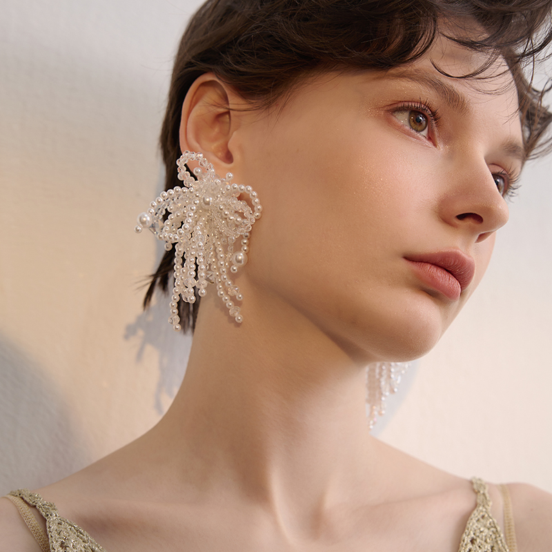 苏心流苏长款珍珠蝴蝶结耳环