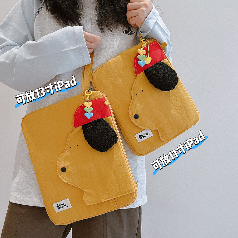 三色补丁卷毛小狗Ipad包2026可爱卡通手腕包多功能百搭休闲保护套