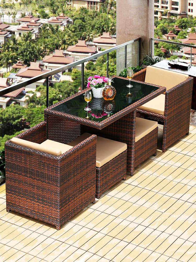 Balcony creative rattan woven table and chair Waterproof terrace Leisure garden Household courtyard Three-piece rattan chair tea table combination