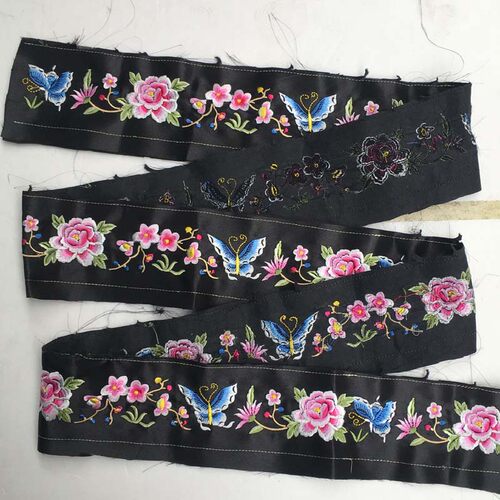 浅粉色长条花边刺绣明制重工面料