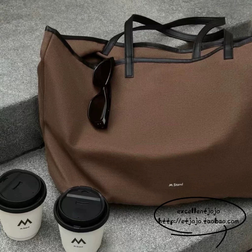 M Stand帆布托特包。手提包单肩包
