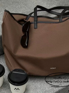 M Stand帆布托特包。手提包单肩包