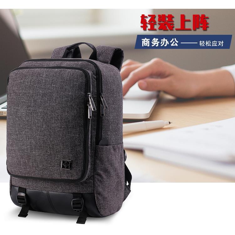 祥兴SUISSEWIN专柜双肩包韩版男学生背包书包旅行包PU拼接SN17109