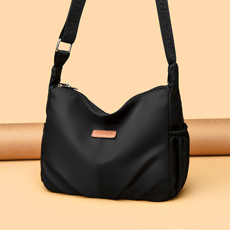 牛津布斜挎包女2026新款包包大容量多隔层轻便单肩小包时尚帆布包