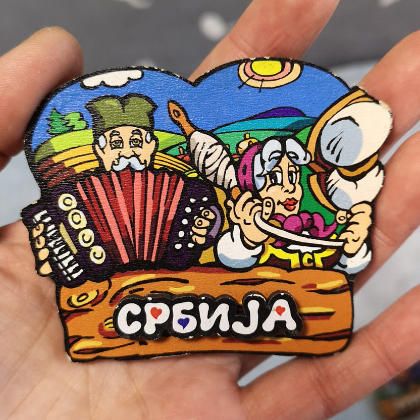 SERBIAN LOCALS BRING BACK BELGRADE FEATURED CARTOON WOODEN FRIDGE MAGNETS