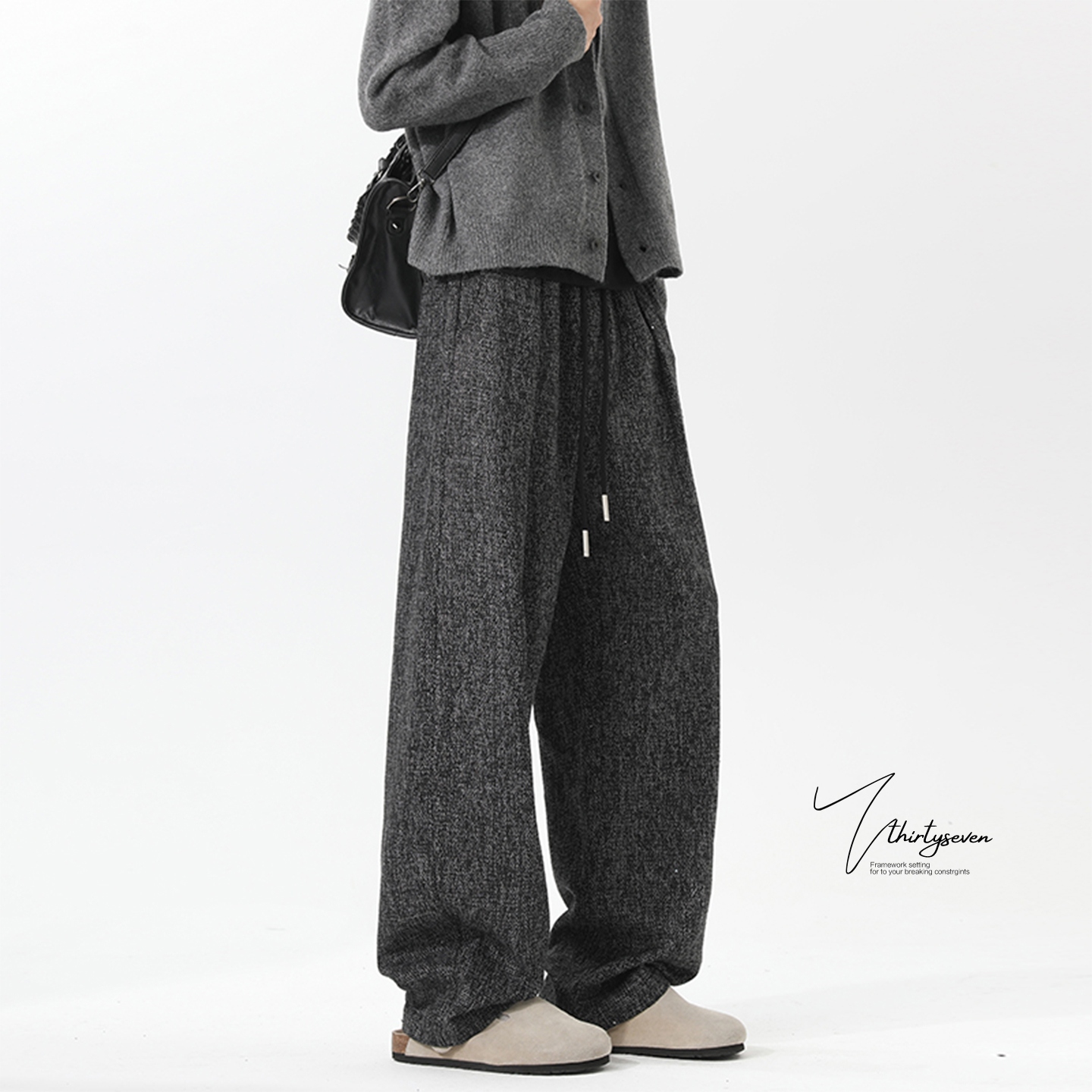 老钱风复古黑弯刀卫裤男