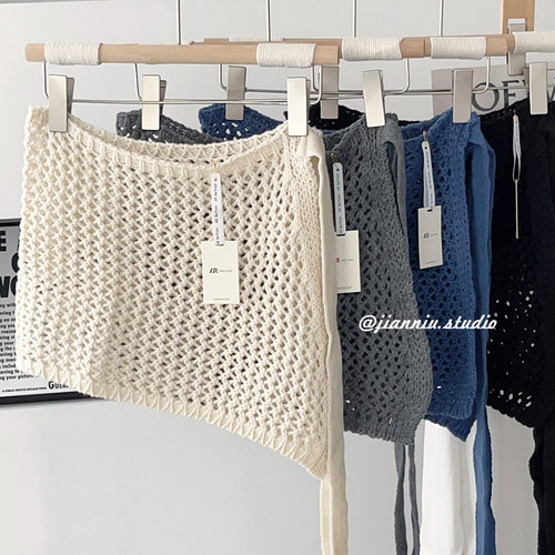 设计感镂空针织绑带屁帘女2025夏季时尚百搭叠穿遮臀显瘦半身裙子